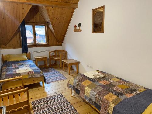 Postel nebo postele na pokoji v ubytování Casa Bucataria Fonix