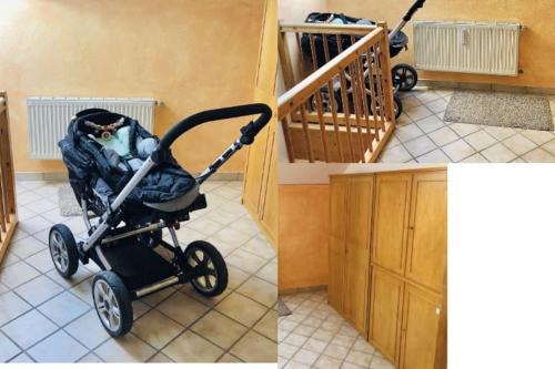 a baby stroller parked in a room with a staircase at Haus Gerda Ferienwohnung 5 in Arnbruck