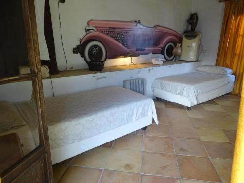 Ένα ή περισσότερα κρεβάτια σε δωμάτιο στο Parador Son Jans Jardin