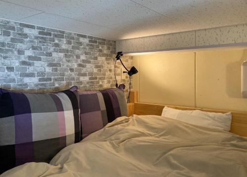 Accommodation Kyotokkoにあるベッド