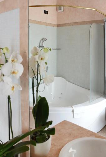 Ein Badezimmer in der Unterkunft Hotel Contà Taste The Experience