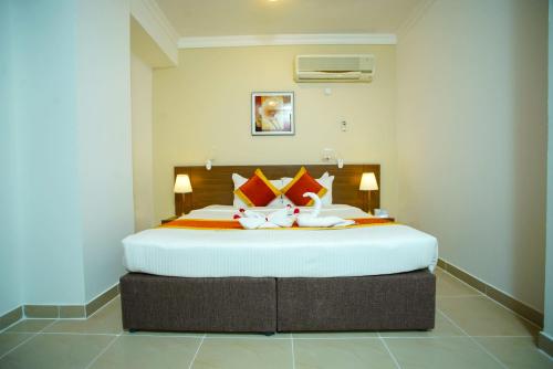 Katil atau katil-katil dalam bilik di La Villa Inn Hotel Apartment