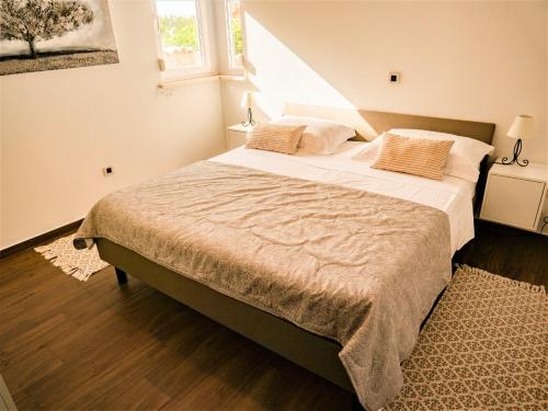 Posteľ alebo postele v izbe v ubytovaní Apartment Sea&Mountain