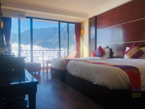 Giường trong phòng chung tại Sapa Vista Hotel