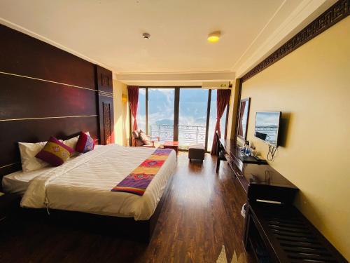 Ένα ή περισσότερα κρεβάτια σε δωμάτιο στο Sapa Vista Hotel