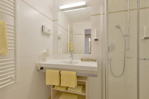 Kúpeľňa v ubytovaní Hotel Mesnerwirt