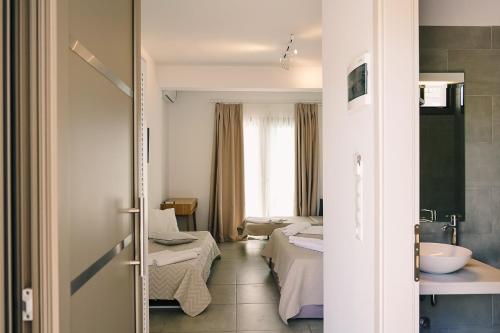 Ванная комната в Stavros Beach Hotel