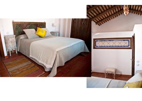 a bedroom with a bed with a yellow pillow on it at CR La Cuadra in Constantina