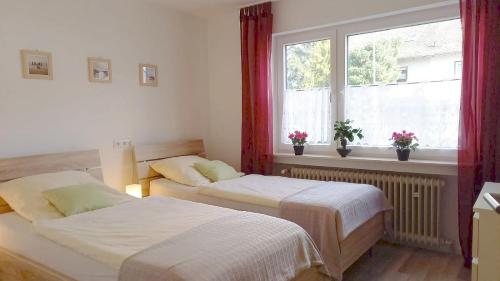 Ένα ή περισσότερα κρεβάτια σε δωμάτιο στο Abendsonne Apartments