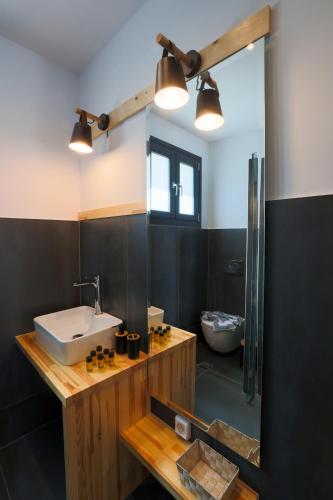 a bathroom with a sink and a shower at SAMI BAYVIEW in Sami