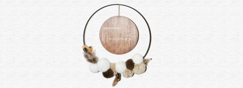 a group of ducks hanging from a mirror at Bergkristall Apartments in Ischgl