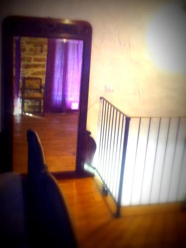 a view of a room with a staircase and a door at Navilla in Igliano