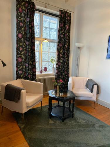 Un lugar para sentarse en Ting1903 Bed & Breakfast