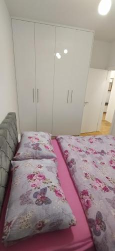 Ένα ή περισσότερα κρεβάτια σε δωμάτιο στο Leo Apartment