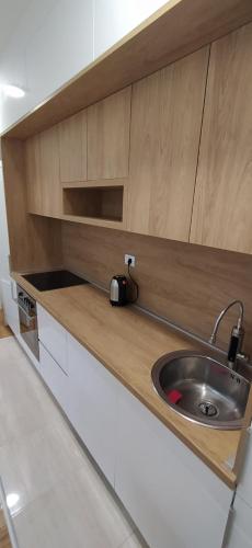 Η κουζίνα ή μικρή κουζίνα στο Leo Apartment