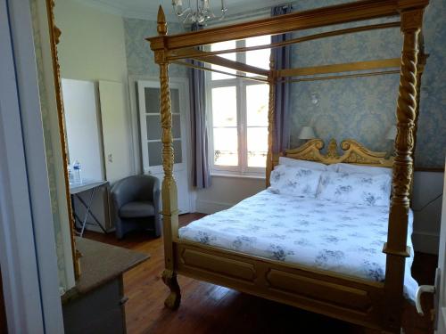 Giường trong phòng chung tại Gîte Chateau baie de somme 10 a 12 personnes