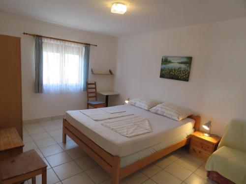 Postel nebo postele na pokoji v ubytování Apartman Vir Gogo br 6