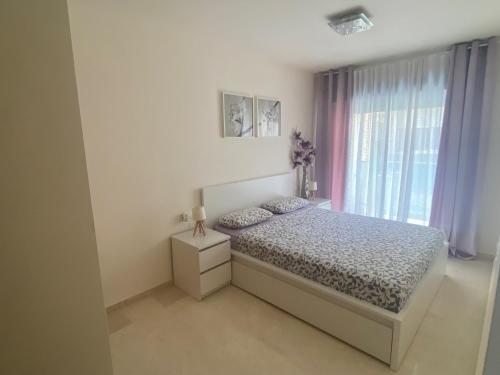 Postel nebo postele na pokoji v ubytování Apartamento Alcotan