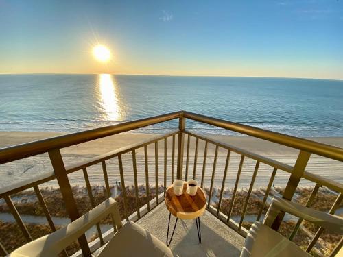a balcony with a view of the beach and the ocean at 1726 Ocean View Galore Pet Friendly in Myrtle Beach