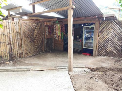 a building with a store with a store front at Casa " MARY " in Lanquín