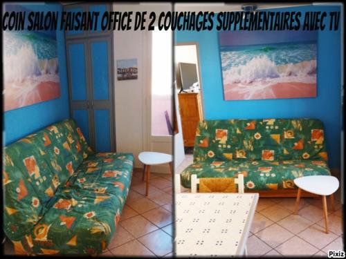 een woonkamer met een bank en een kalender bij appartement du pecheur in Valras-Plage