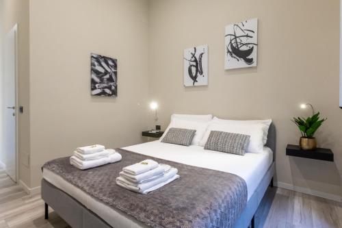 מיטה או מיטות בחדר ב-Suites 44
