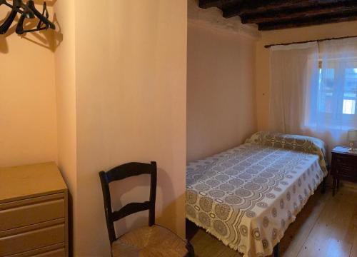 Giường trong phòng chung tại La Casa de la Abuela