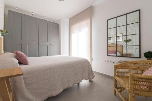 Cama o camas de una habitación en Sol de Sanlúcar Ático centro Parking incluido