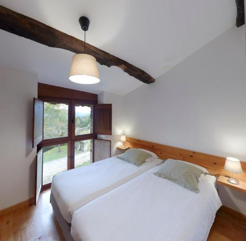 Postel nebo postele na pokoji v ubytování Casa de Aldea Casina de Rubio