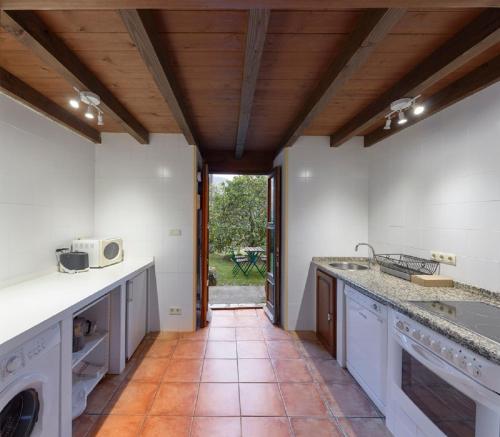 Kuchyň nebo kuchyňský kout v ubytování Casa de Aldea Casina del Naranjo