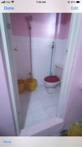 a bathroom with a toilet and a tub at LP Madriaga Private Apt fully furnished w/Balcony in Ayusan Norte
