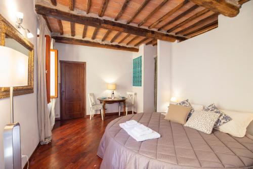Ένα ή περισσότερα κρεβάτια σε δωμάτιο στο Graziosa Suite vista mare [FREE PARKING]