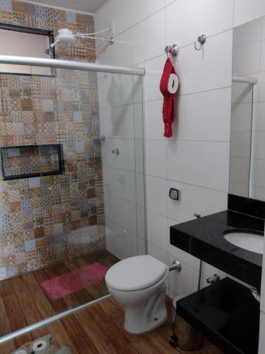 Ванна кімната в Suítes Ponta do Sol (Trator)
