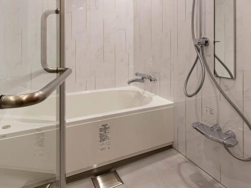 Kylpyhuone majoituspaikassa Akabane Holic Hotel