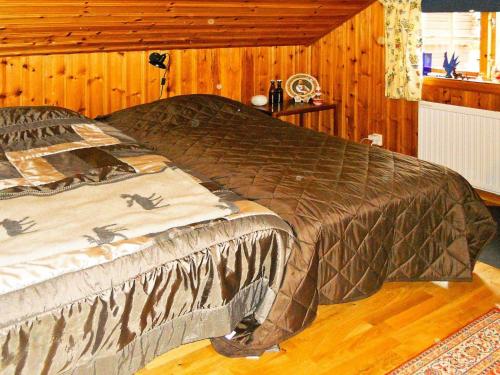 Ένα ή περισσότερα κρεβάτια σε δωμάτιο στο 4 person holiday home in RÄTTVIK-By Traum