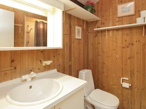 a bathroom with a sink and a toilet at 10 person holiday home in Bindslev-By Traum in Bindslev