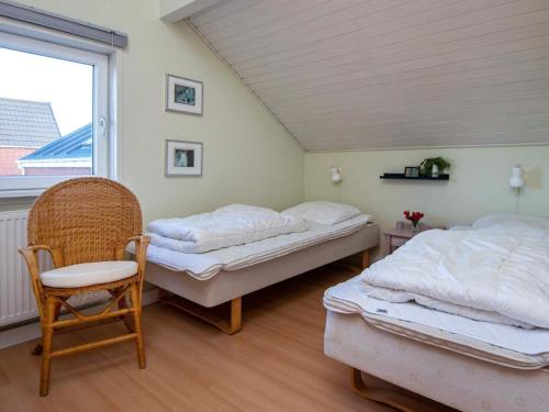 Krevet ili kreveti u jedinici u objektu Three-Bedroom Holiday home in Rømø 39