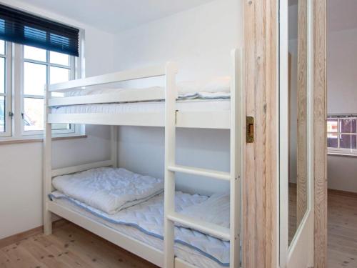Postel nebo postele na pokoji v ubytování Holiday Home Anker II