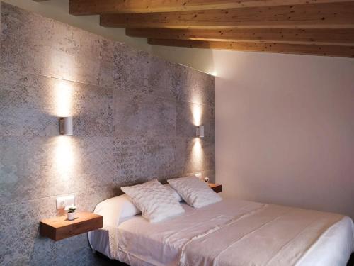 Katil atau katil-katil dalam bilik di Los Olmos Alojamiento Rural
