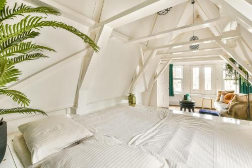 Ліжко або ліжка в номері Spiegelgracht Apartments with Canal View