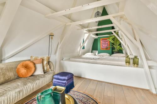 Ένα ή περισσότερα κρεβάτια σε δωμάτιο στο Spiegelgracht Apartments with Canal View