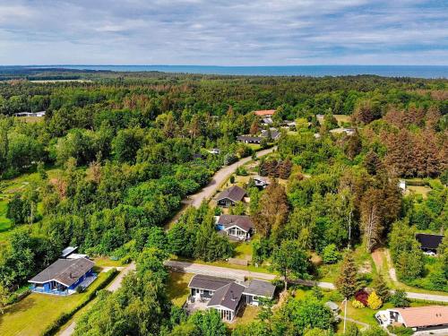 an aerial view of a house in a forest at 8 person holiday home in Gedser in Gedser