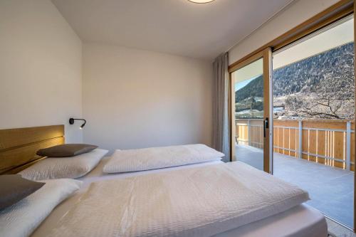 Ένα ή περισσότερα κρεβάτια σε δωμάτιο στο sunnig Apartment Sonnenlicht