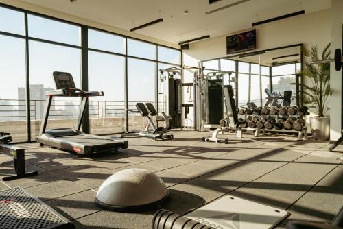 a gym with a lot of equipment in a building at The President Hotel Cairo in Cairo