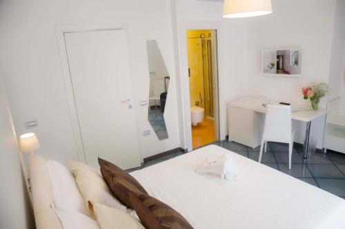 Dimora Salernum Apartmentにあるベッド