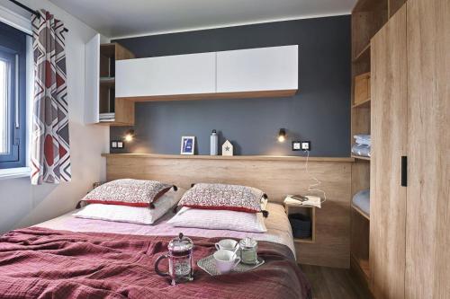 Posteľ alebo postele v izbe v ubytovaní Camping l'Oso