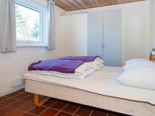 Postel nebo postele na pokoji v ubytování 8 person holiday home in Odder