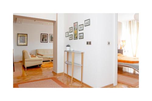 a living room with a couch and a table at Sarajevo Apartments No.5 in Sarajevo