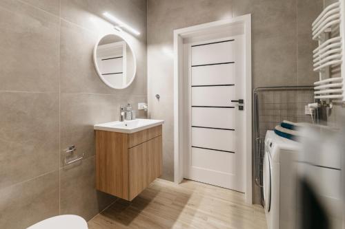Ένα μπάνιο στο Nocosfera Apartament Wrocławski