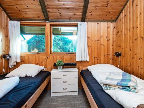Postel nebo postele na pokoji v ubytování Holiday home Knebel XLIV